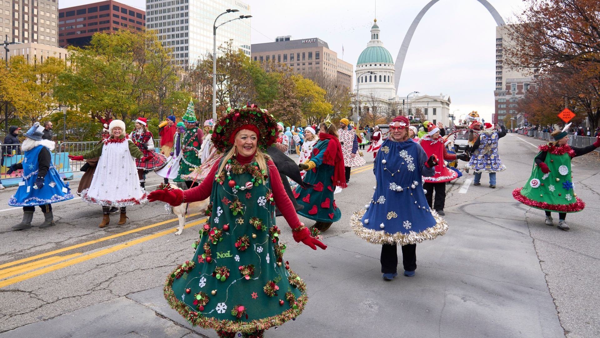 Ladies in tree costumes join the St Louis Thanksgiving parade in downtown.