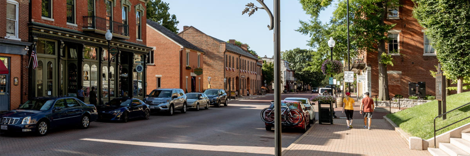 Visitors enjoying antique shopping in a historic St. Louis neighborhood.