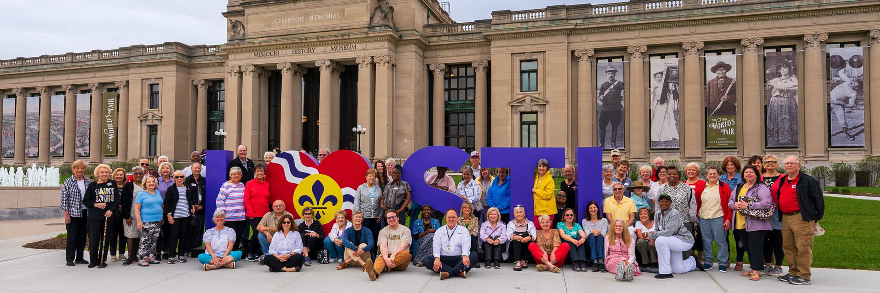 Explore St. Louis Volunteers in front of the The Missouri History Museum during a familiarization tour.