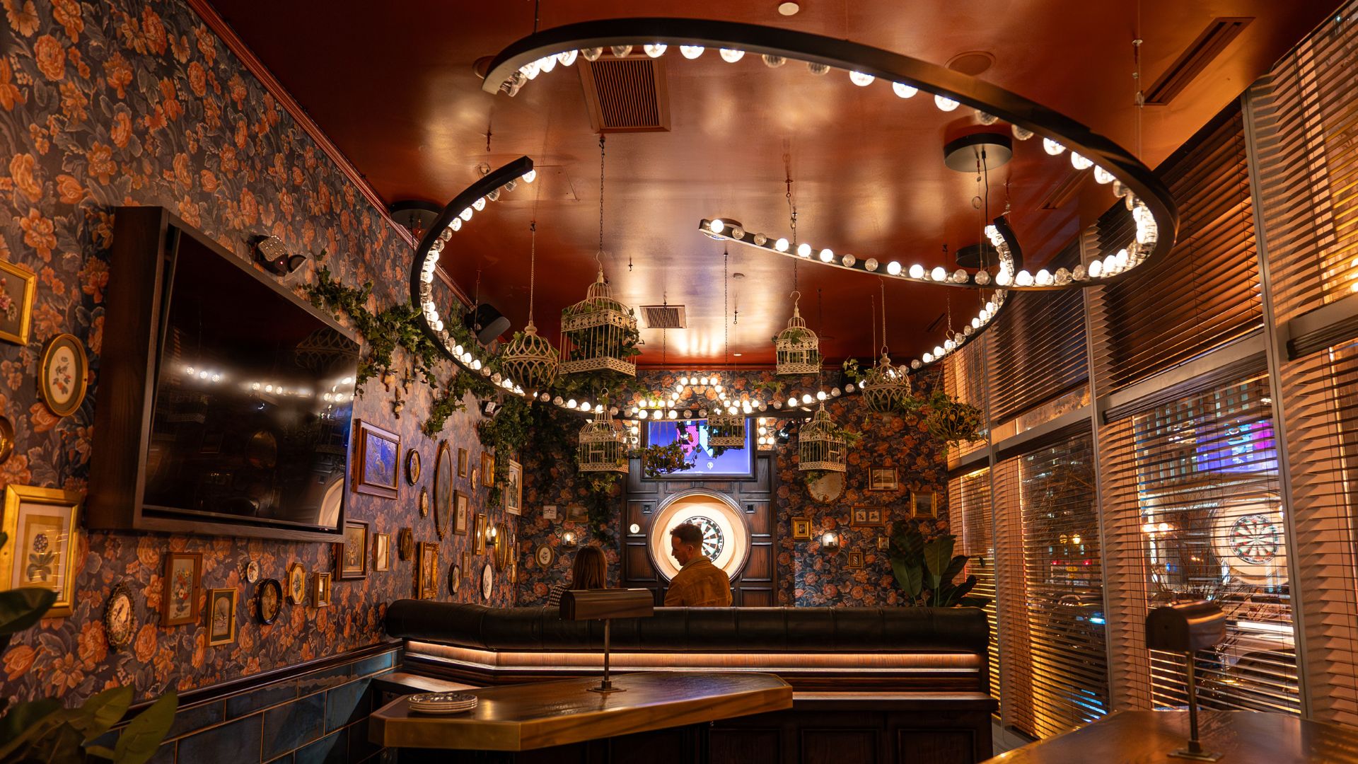 A new social darts bar in St Louis has whimsical décor and fairground lighting.