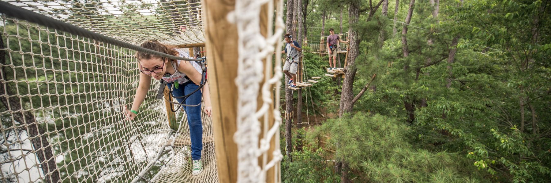 Kids navigate a high-ropes course at Go Ape, one of many outdoor activities in St Louis.