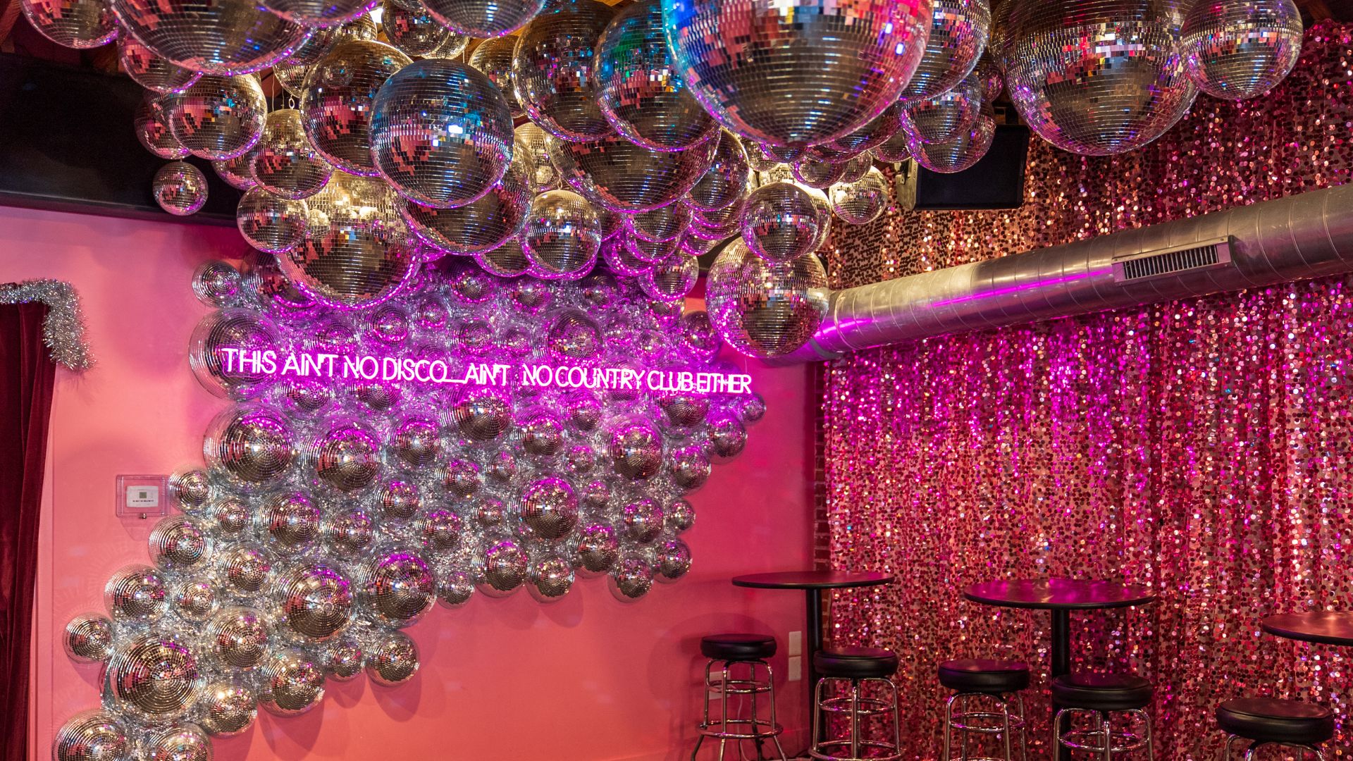 Hidden Gems boasts 300 disco balls and a neon sign that reads, 