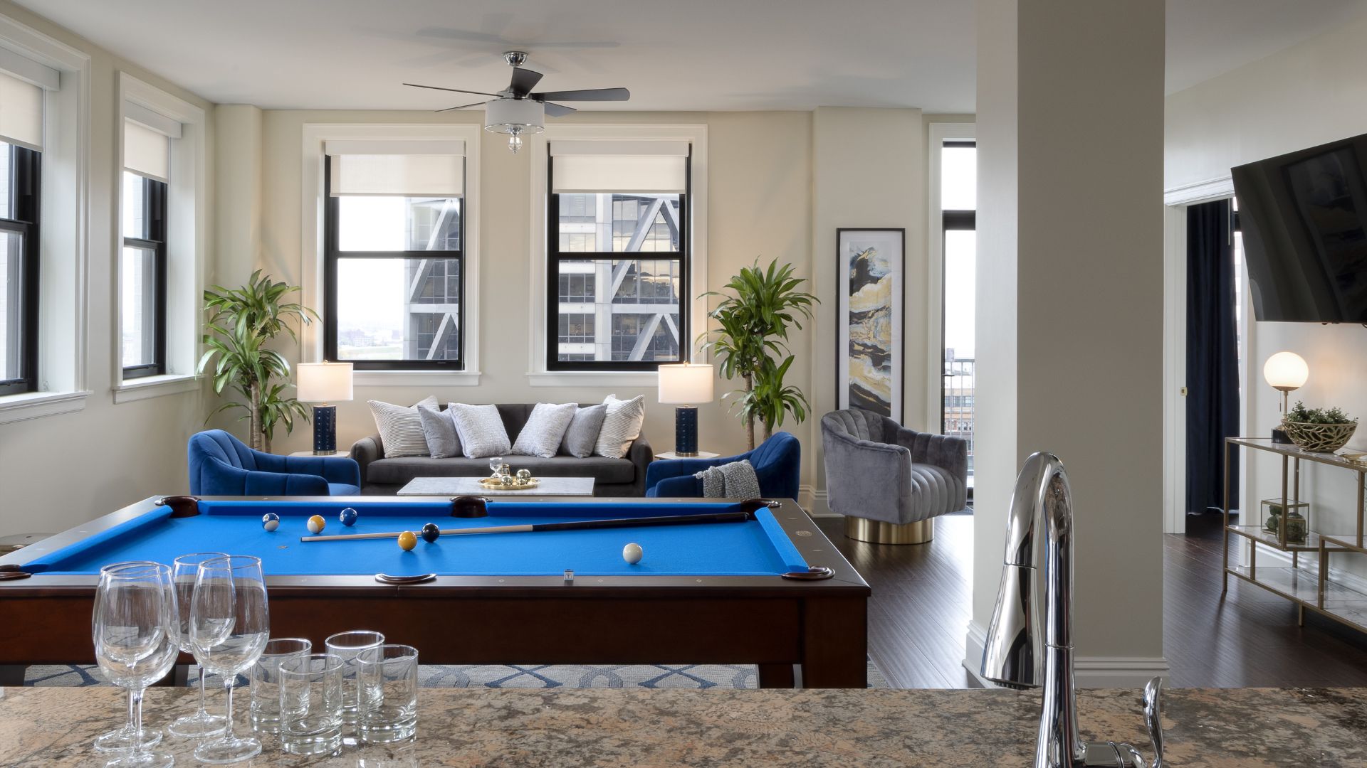 The dining table in the penthouse of Hotel Saint Louis doubles as a pool table.