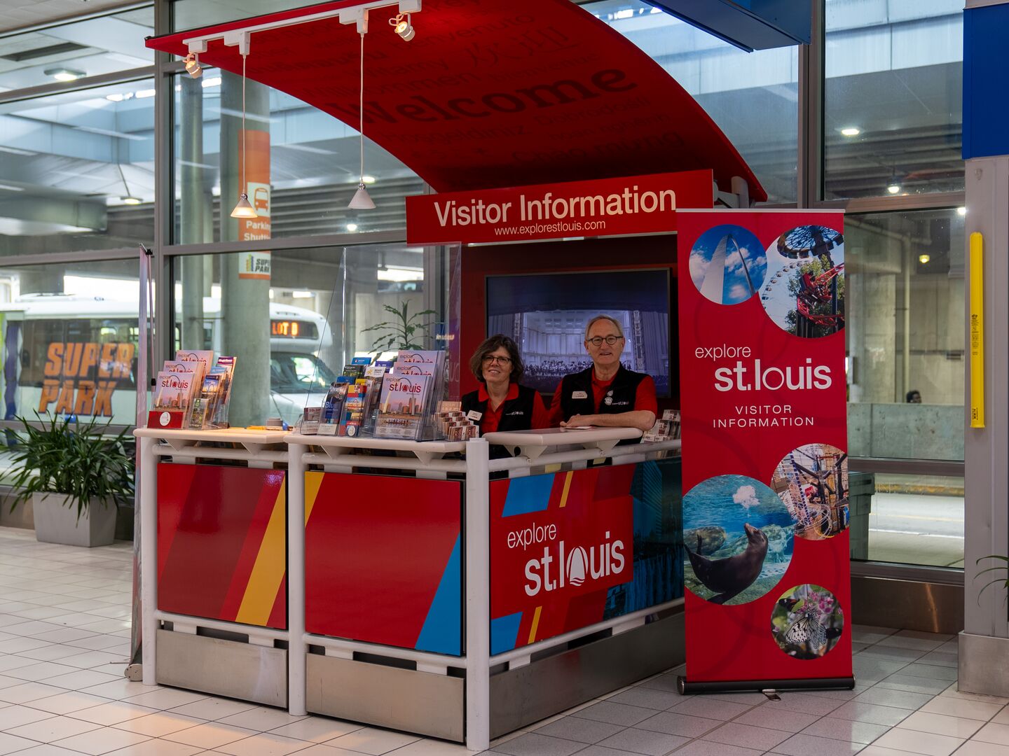 Volunteers at the Explore St. Louis visitor center in Terminal 2 of St Louis Lambert International Airport.