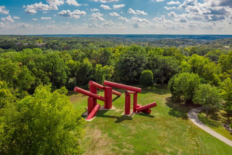 The Way, an outdoor sculpture at Laumeier Sculpture Park, features giant red cylinders.