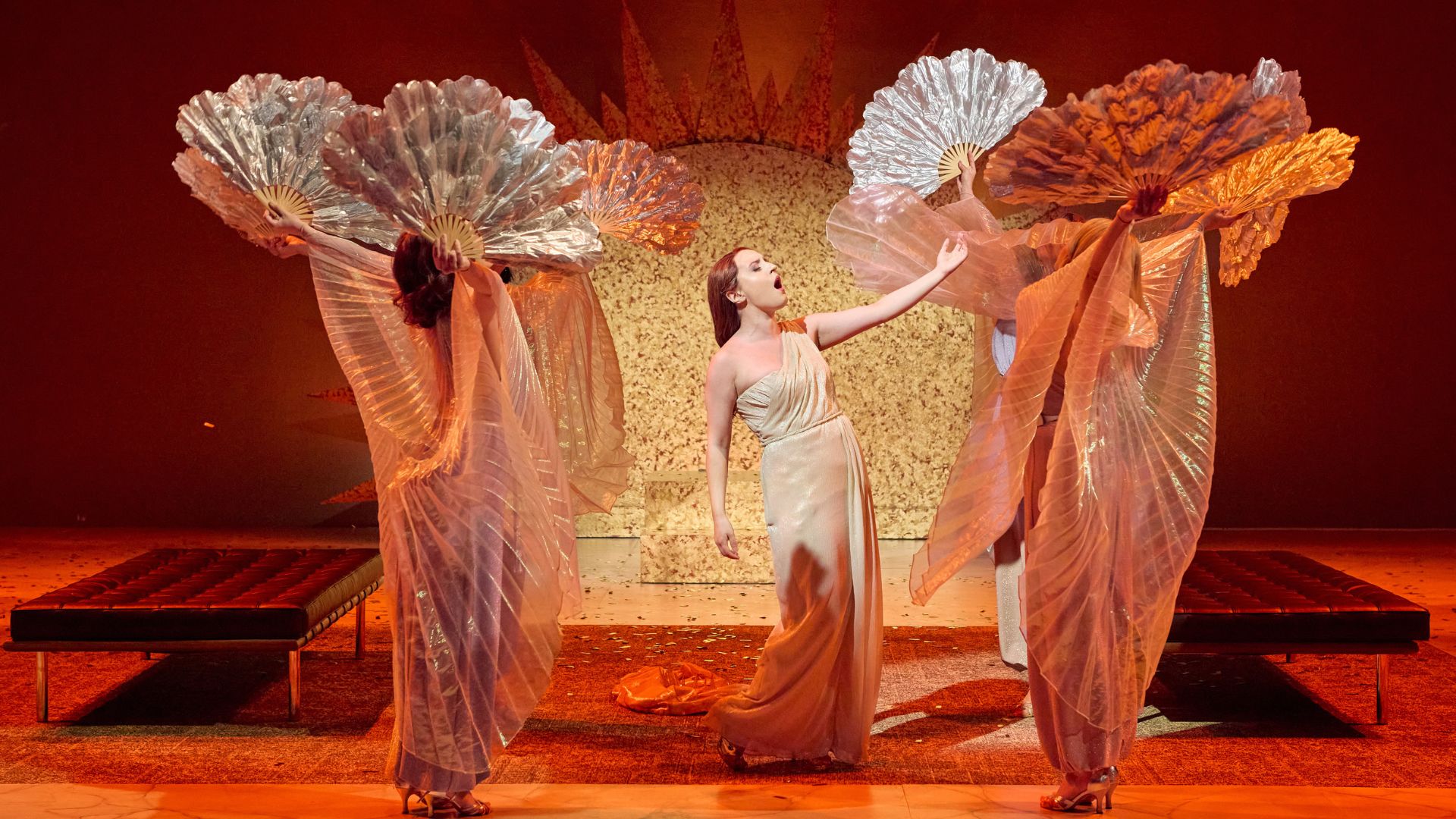 Actors sings and dance in a production of Julius Caesar by Opera Theatre of Saint Louis.