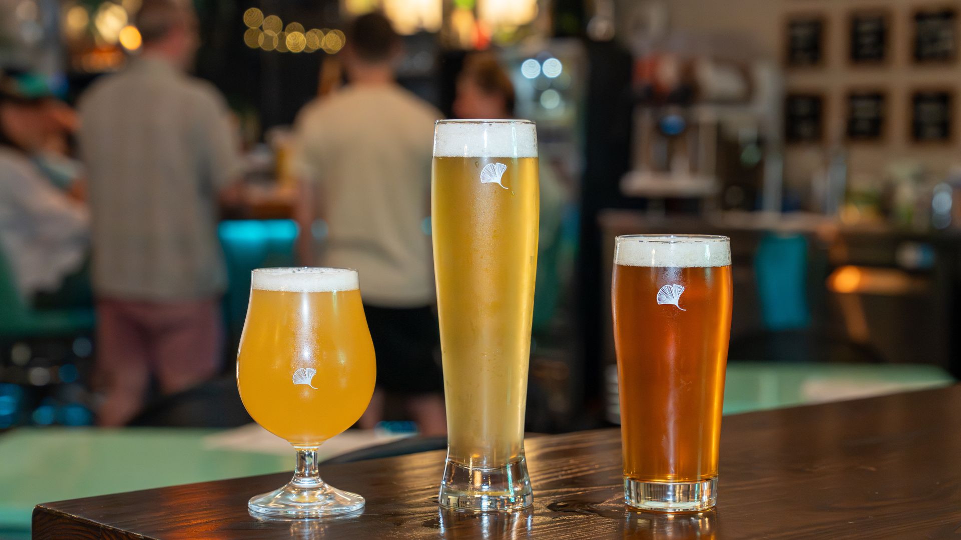 Three different beers from Perennial Artisan Ales sit on a table of the St Louis brewery.