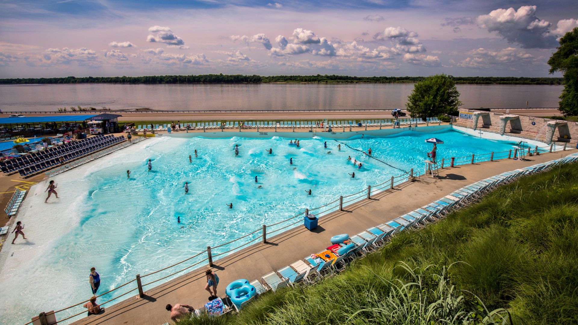 Swimmers enjoy the wave pool at Raging Rivers Waterpark during summer in St Louis.