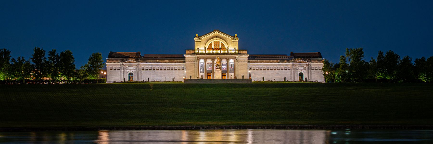 The Saint Louis Art Museum shines on top of Art Hill in Forest Park at night.
