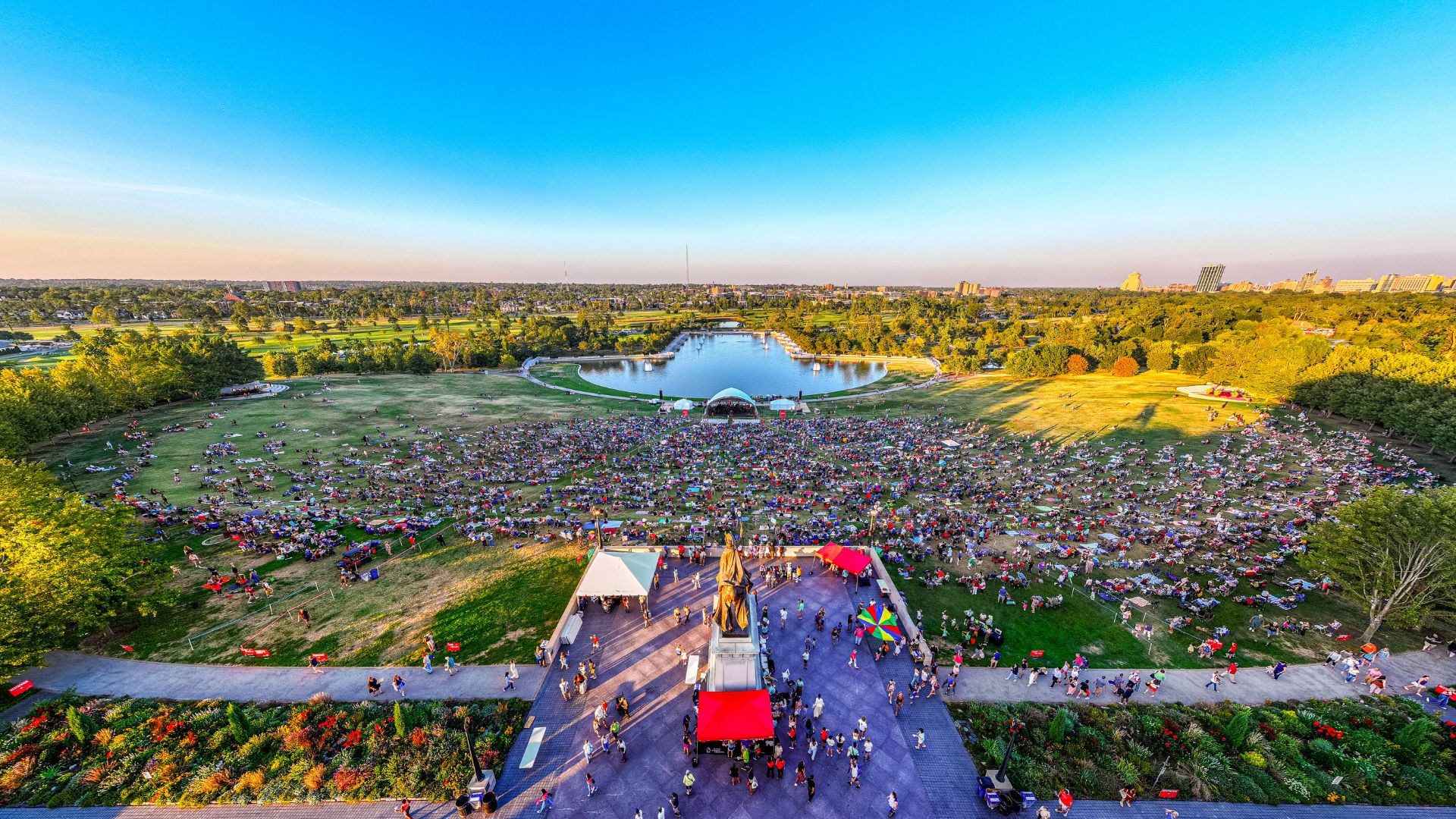 Classical music lovers cover the grass of Forest Park during a St Louis Symphony Orchestra concerts.