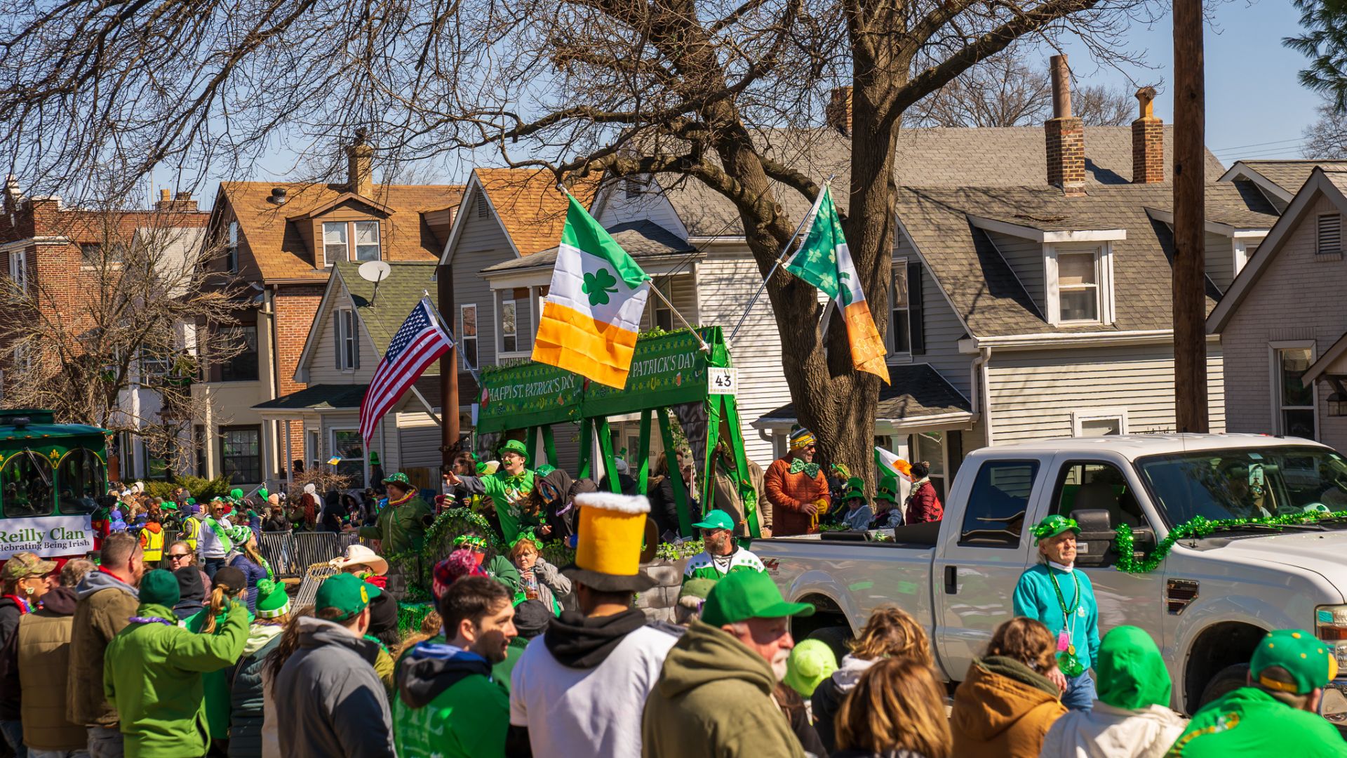 A parade courses through the streets of Dogtown on St. Patrick's Day in St. Louis.