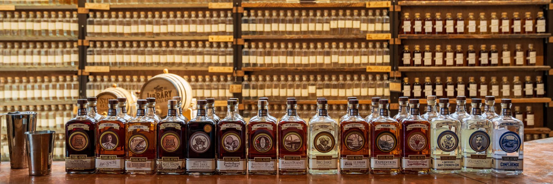 StilL 630 spirits line the bar in front of the distillery's library of distillates.